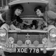 Rally legends Pat Moss and Ann Wisdom under the hood.